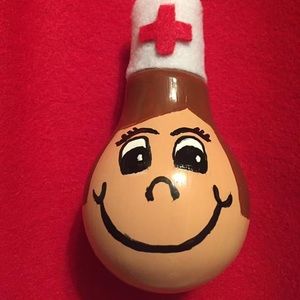 Repurposed Lightbulb Nurse Ornament.
